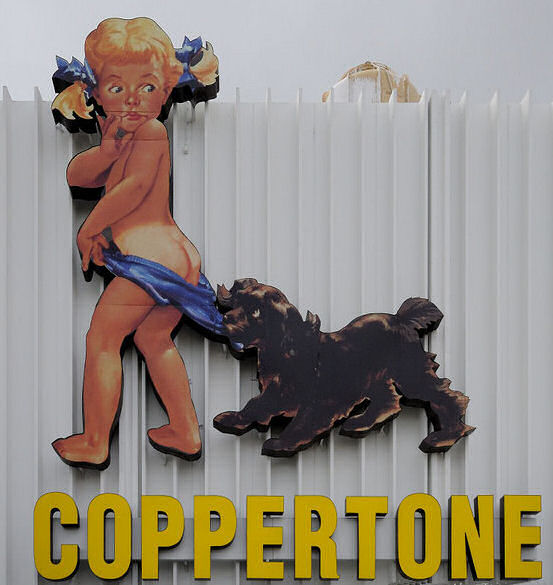 Coppertone Girl Sign